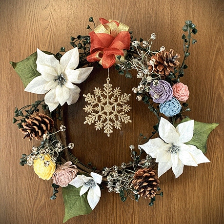 Adding decorations creates a one-of-a-kind wreath