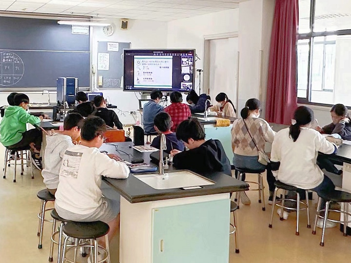 Students thinking hard about their answers to the quiz